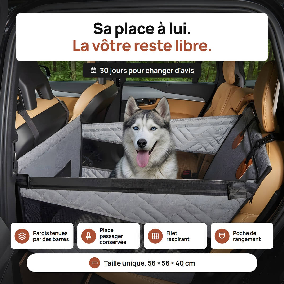 Husky assis dans le panier de voiture Yzavo installé sur une moitié de banquette arrière